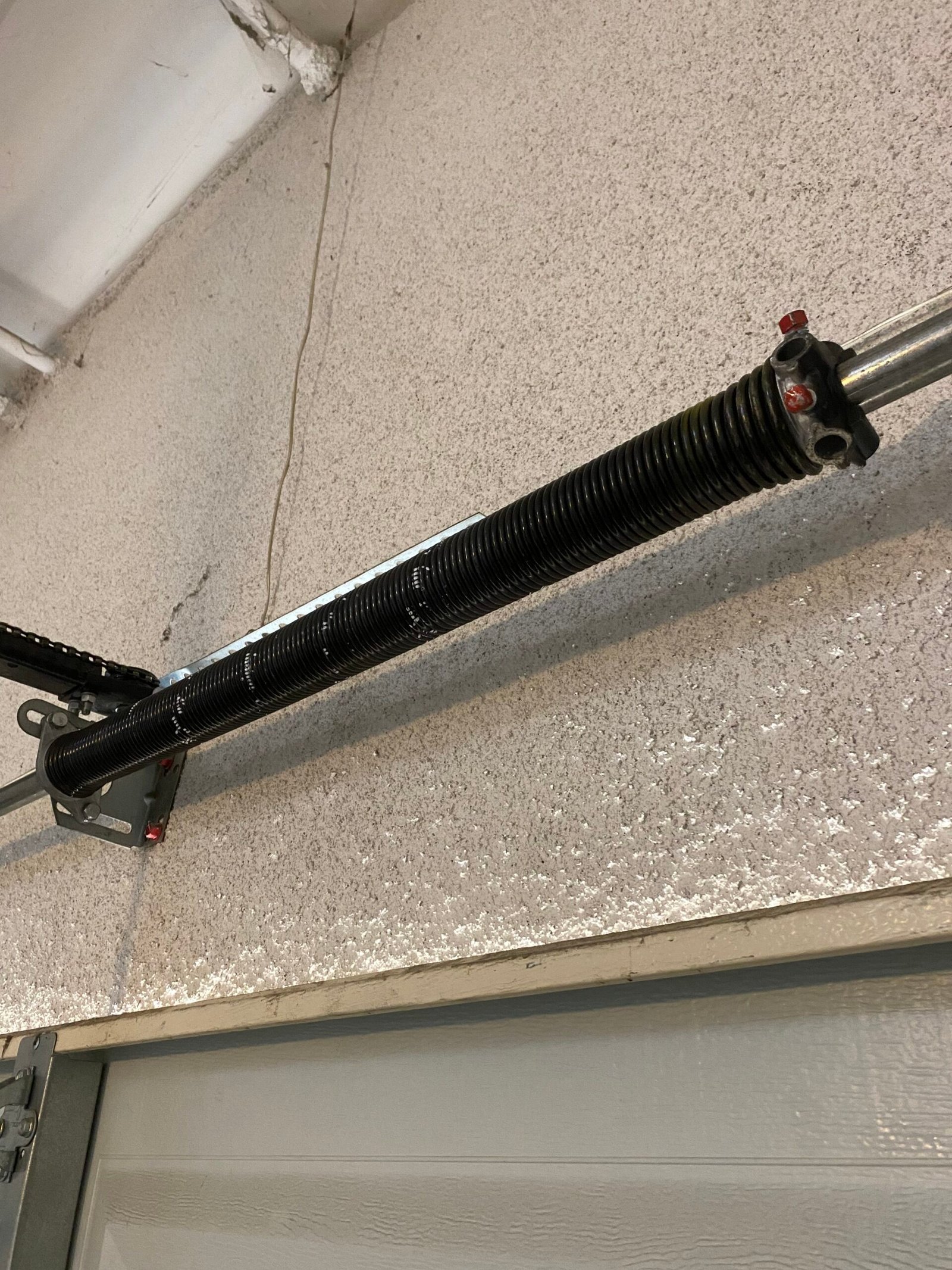 Garage door tune-up Pasadena CA with torsion spring inspection