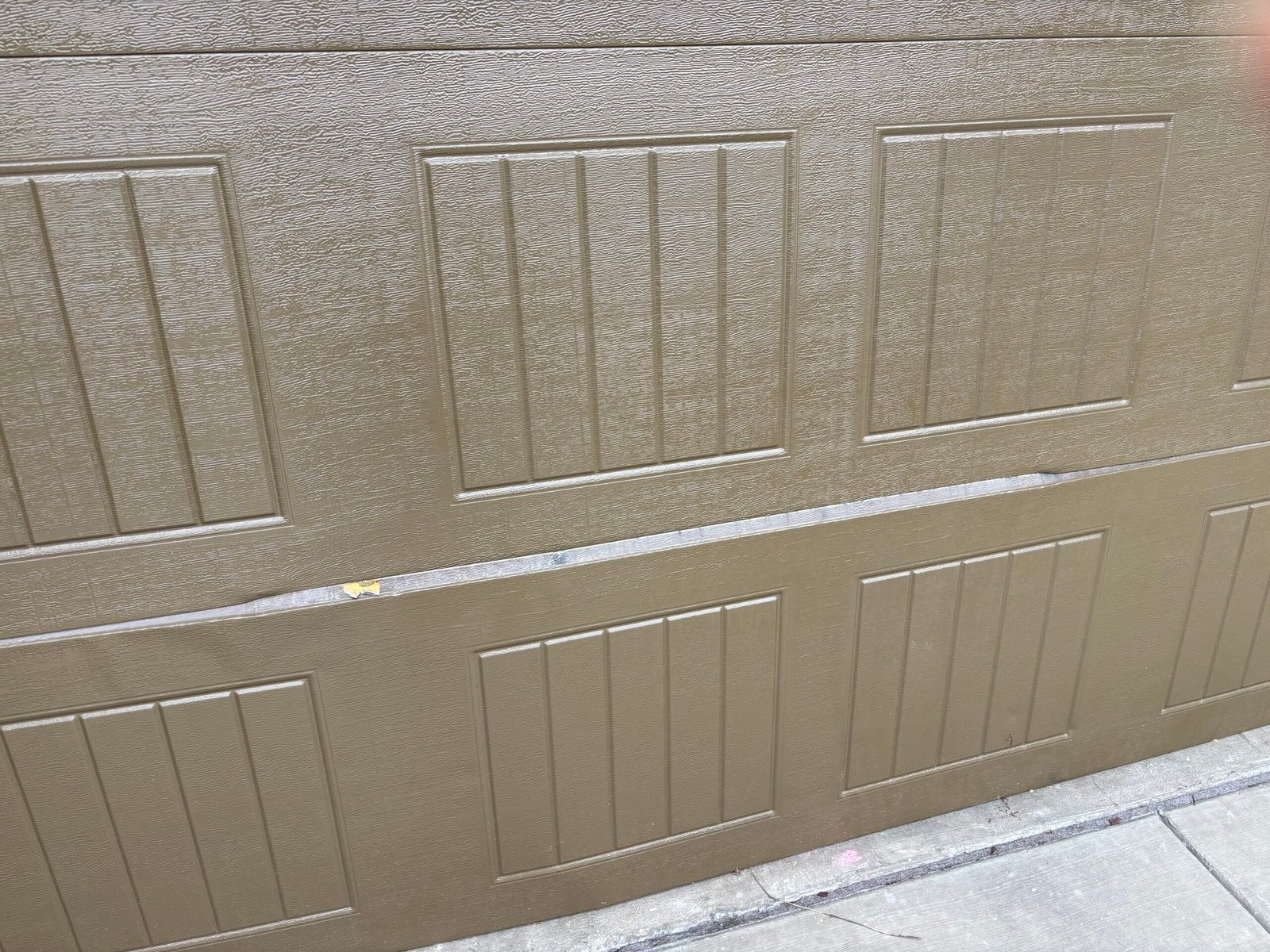 Bent garage door panel repair and panel replacement in Pasadena CA