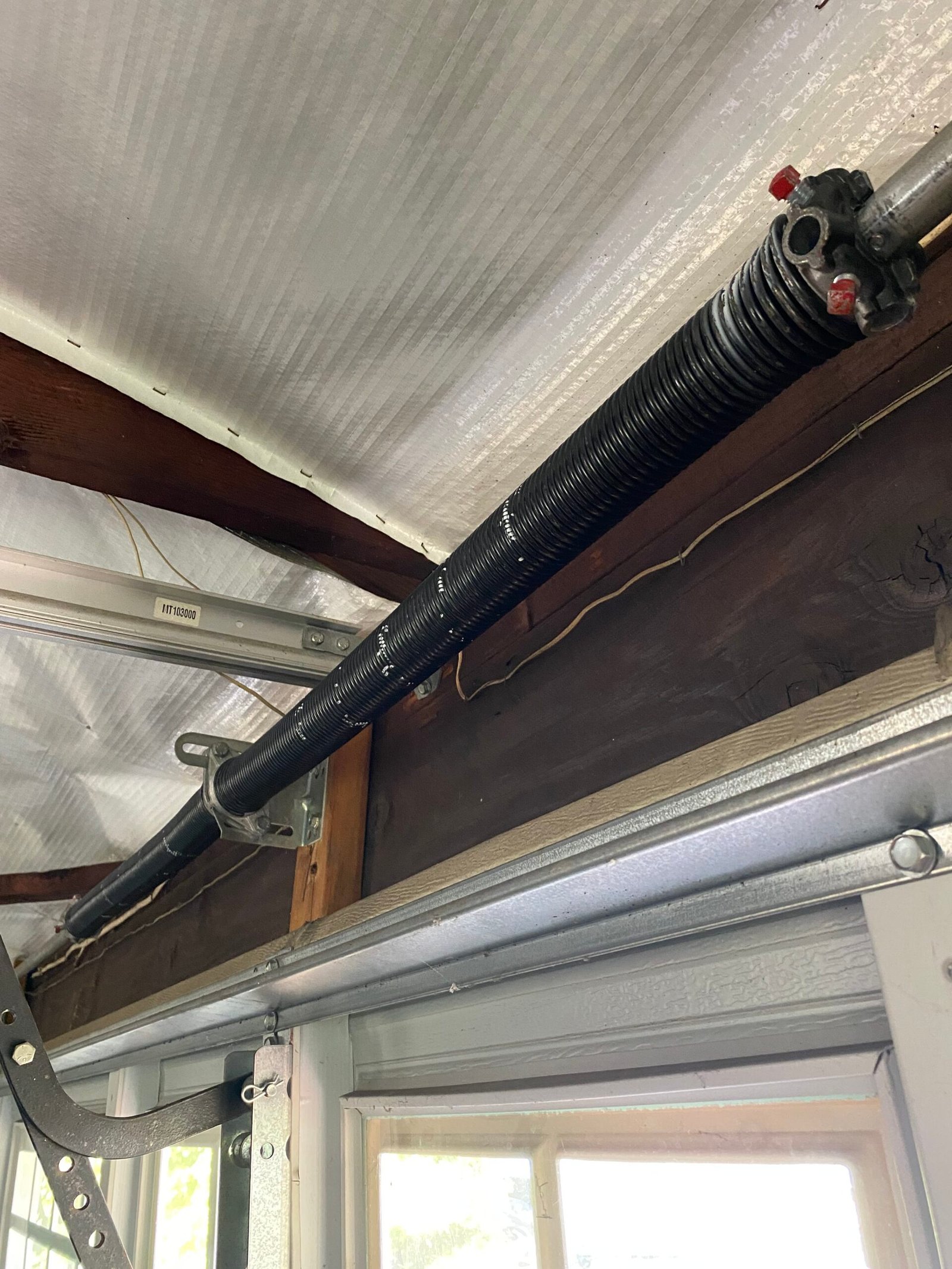 Residential garage door secured before spring replacement in Pasadena CA