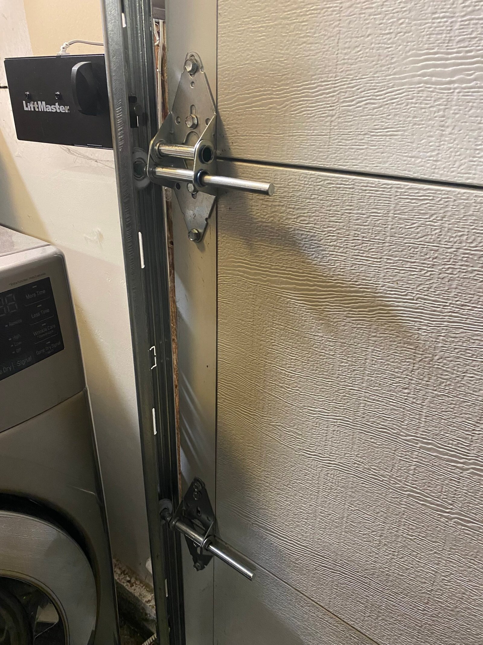 Garage door tune-up and maintenance after off-track garage door repair in Old Pasadena CA